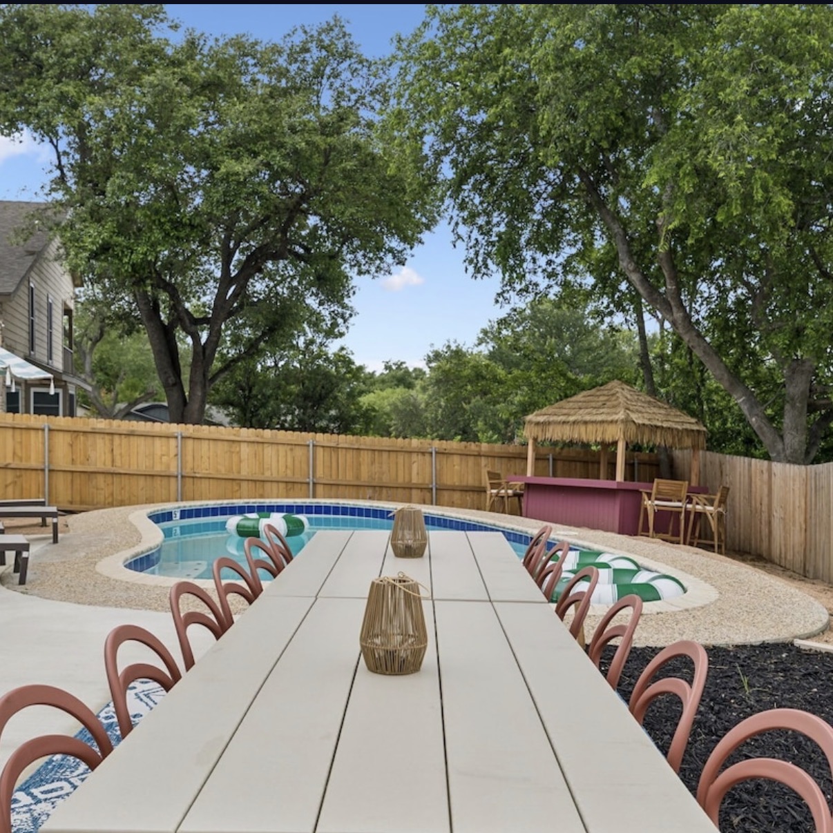 Heated pool with swim-up loungers